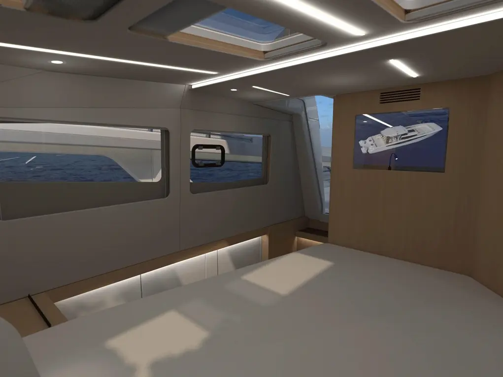 Modern boat interior featuring large windows, a bed, and a TV displaying a yacht, with marine views visible outside.